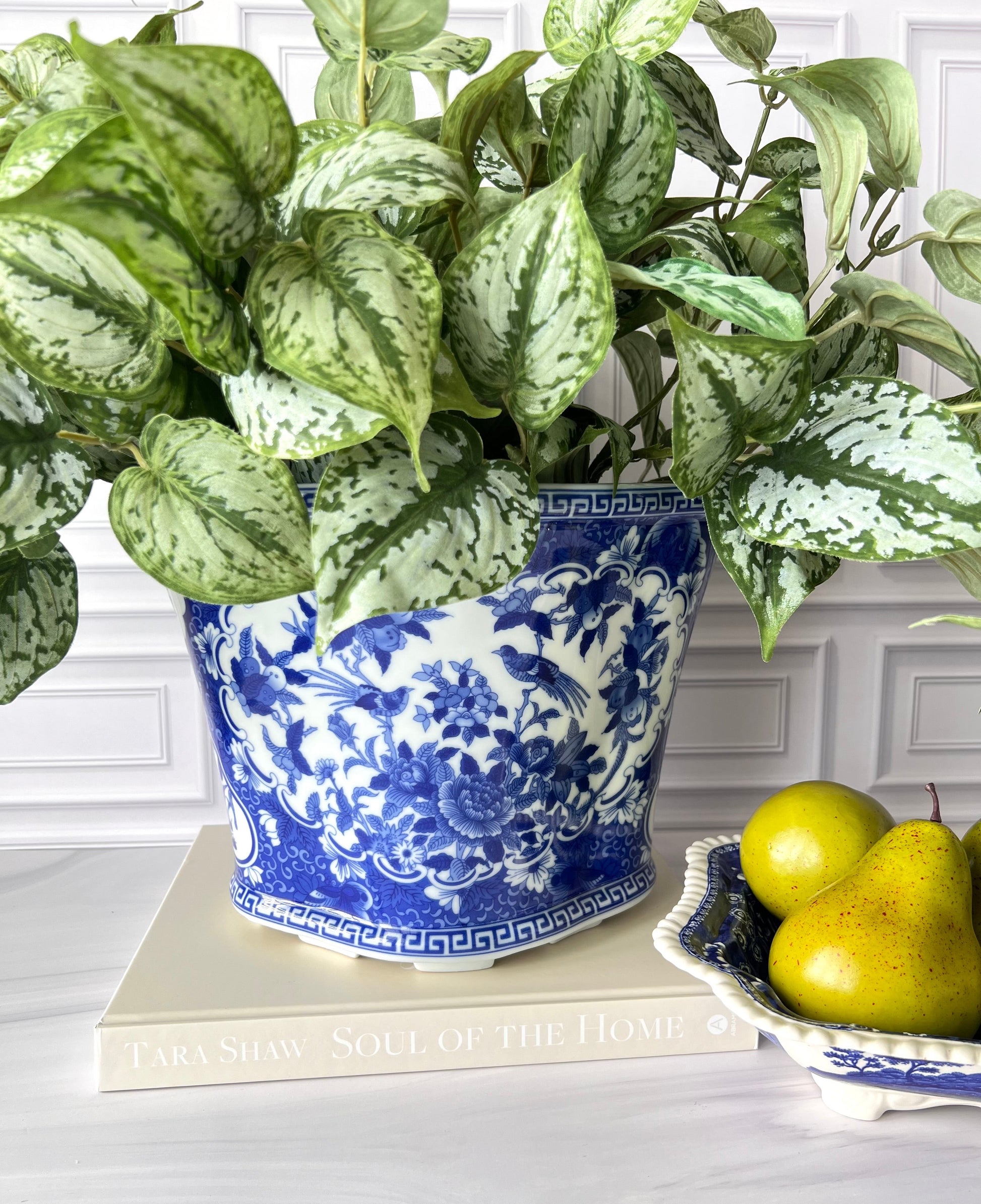 Chinoiserie bird and floral planter styled with greenery.