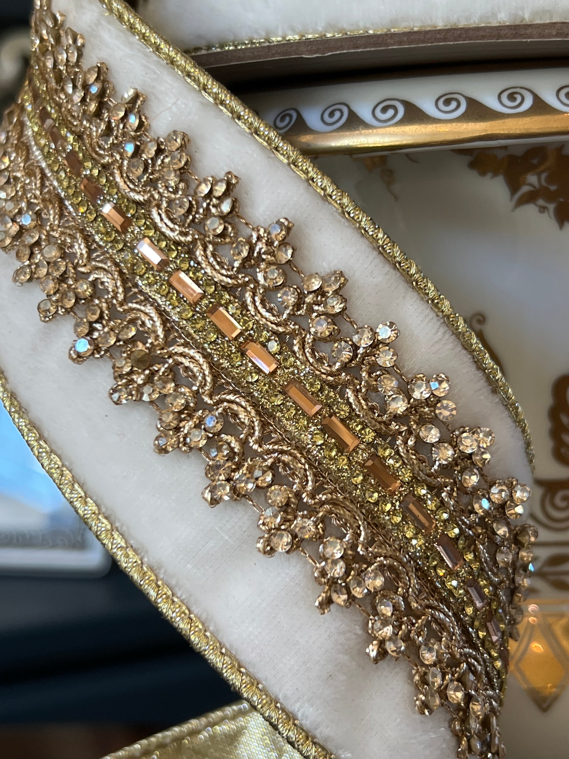Winter white velvet ribbon with gold jeweled trim and crystal embellishments.