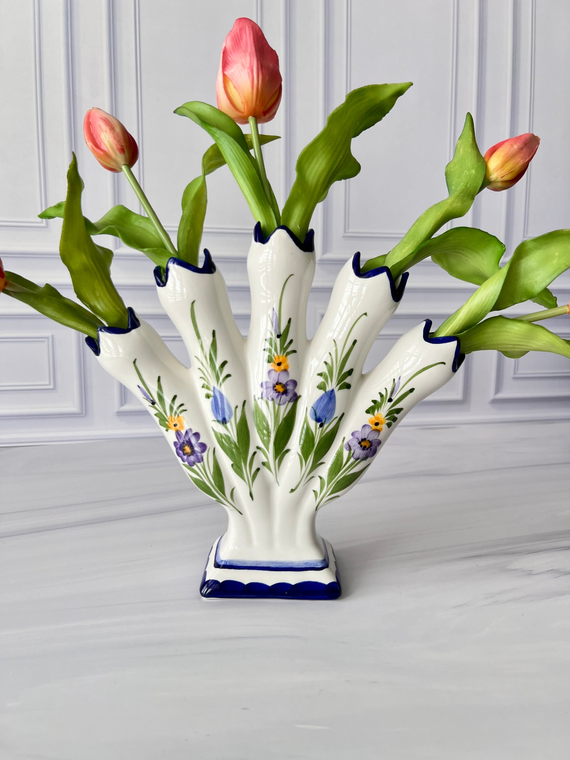 Vintage Portuguese hand-painted ceramic tulipiere displaying pink tulips with blue floral decoration.