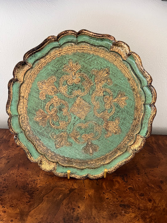 Green and gold Italian Florentine gilt wood tray with ornate raised design and scalloped edge.