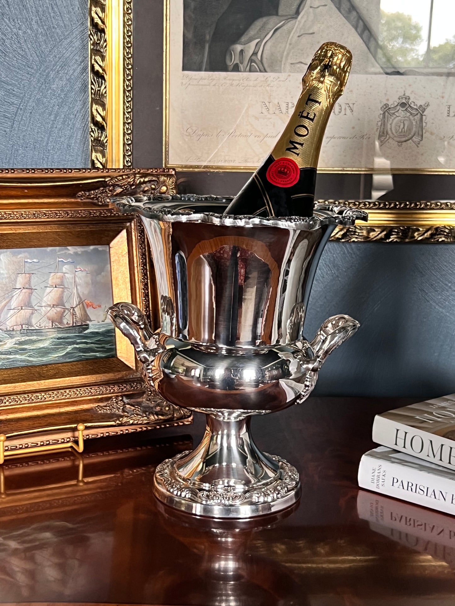 Vintage Poole England champagne cooler with a champagne bottle in a classic styled interior
