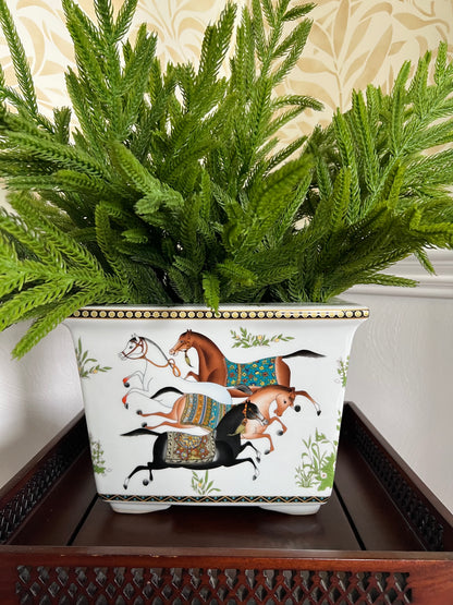 Porcelain cachepot with painted horse motif and chinoiserie detailing.