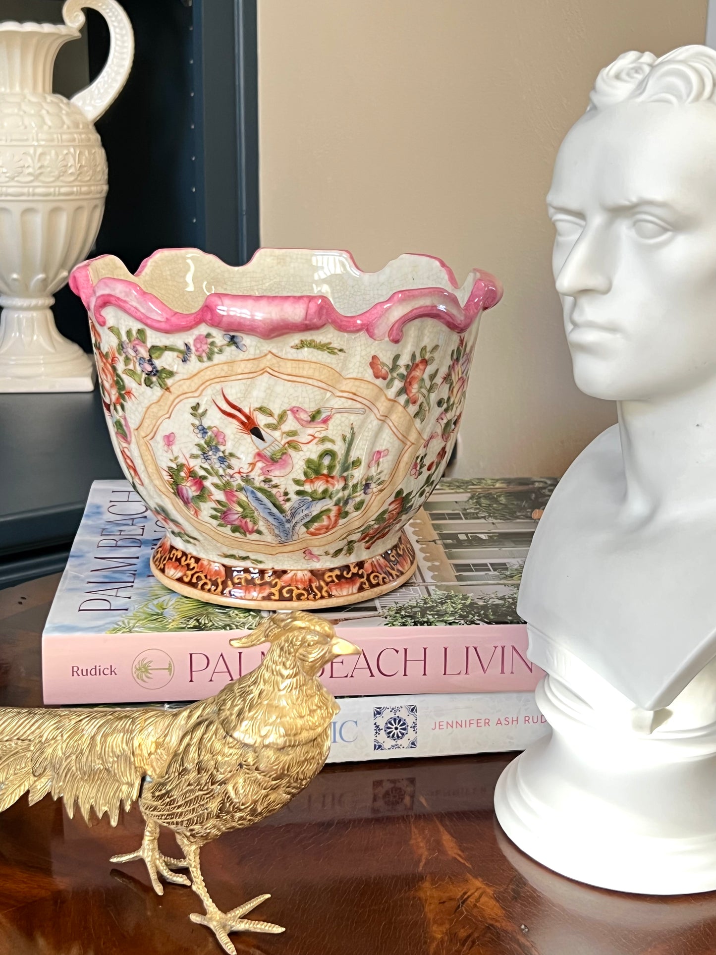 Pink scalloped porcelain chinoiserie planter with colorful bird and blossom interior, 8.5 x 8.5 x 6.5 inches.