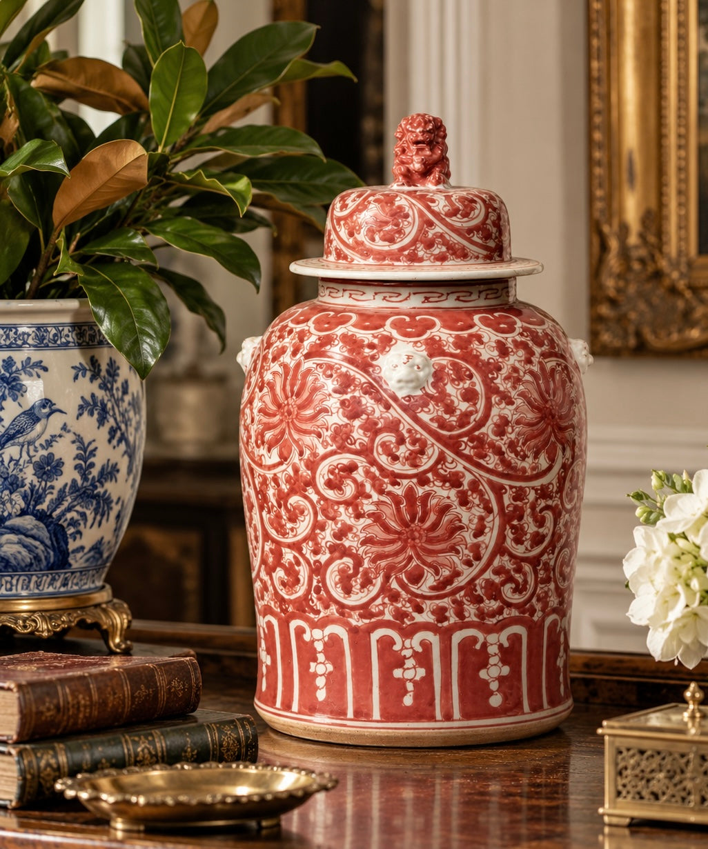 Coral red and white Chinoiserie porcelain temple jar with foo dog finial, 19.5 inches tall