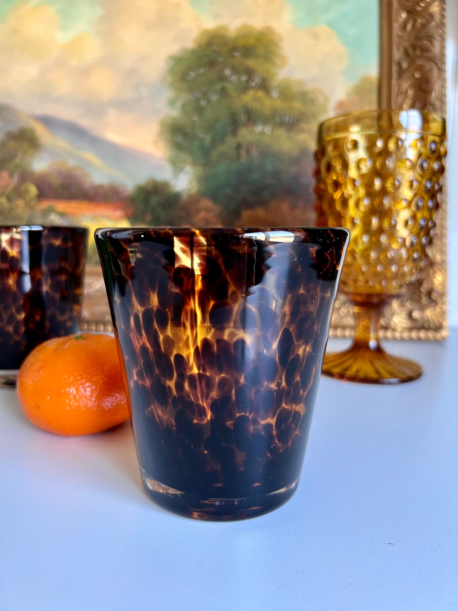 8 oz tortoise shell glass tumbler with dark brown and amber pattern
