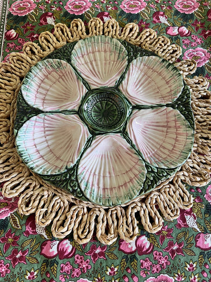 Hand-painted pink and green Portuguese oyster plate with six sculpted shell wells and dimensional green majolica-style detailing.