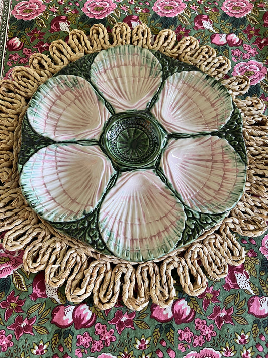 Hand-painted pink and green Portuguese oyster plate with six sculpted shell wells and dimensional green majolica-style detailing.