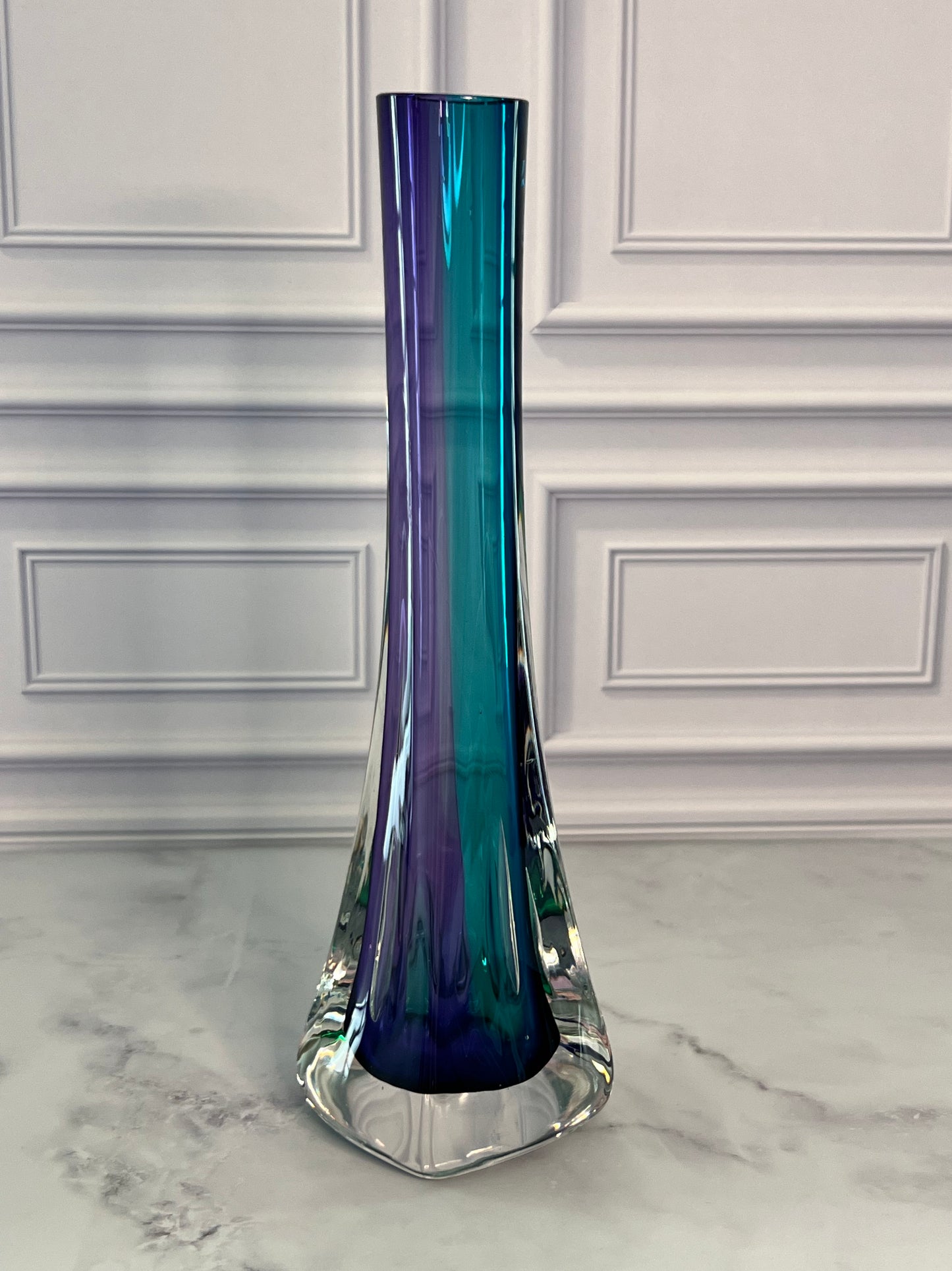 Signed Grant 10-inch Sommerso art glass bud vase featuring a solid cased design with triple-layer amethyst, blue, and green colors.
