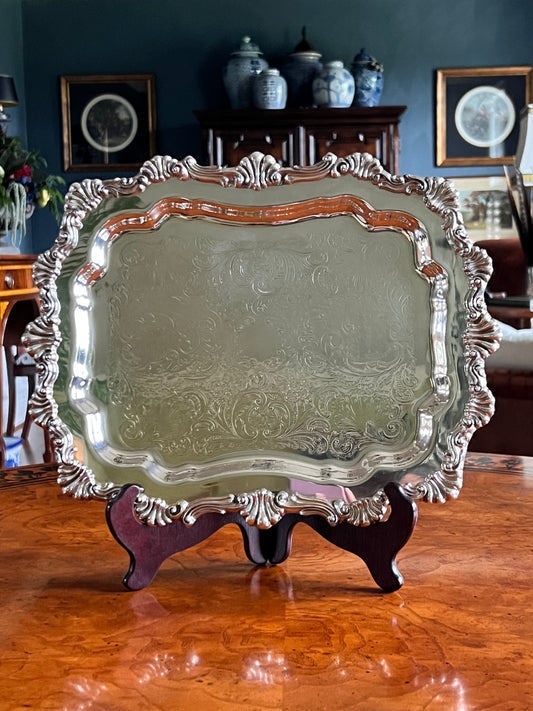 Vintage F.B. Rogers silverplate footed serving tray with ornate engraved detail